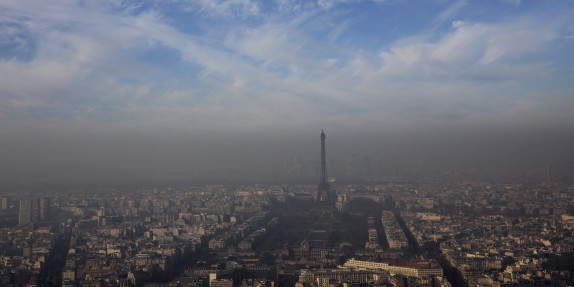 The Eiffel Tower is seen through a small-particle haze resulting in a high level air pollution index according to Airparif, the air quality monitoring agency, in Paris